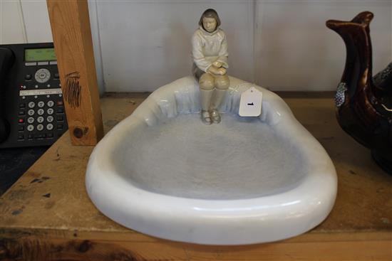 Bing & Grondahl porcelain figure, Greenlander, Inuit girl seated beside a frozen lake (no. 2253)